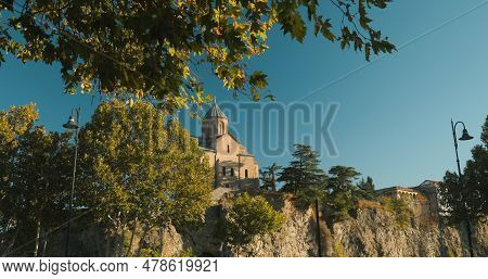Tbilisi, Georgia.famous Landmarks. View On Metekhi Church With Landmark Equestrian Statue Of King Va