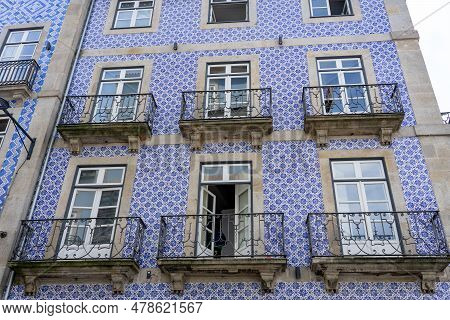 Beautiful Colorful Building Facede In Porto Portugal With Azulejo Tiles