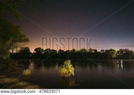 Starry Night Sky Above River. Concept Of Meditation. Calmness And Serenity. Calm Night. Clear Starry