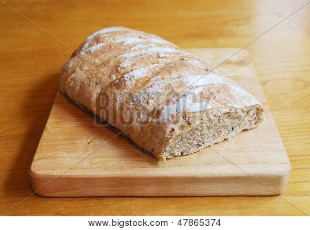 Sourdough On Wooden Chopping Board