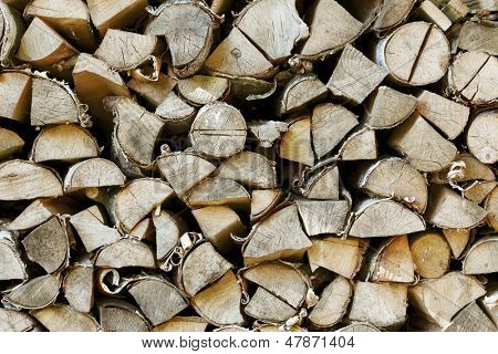 Firewood stack background close-up