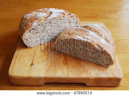 Sourdough On Wooden Chopping Board