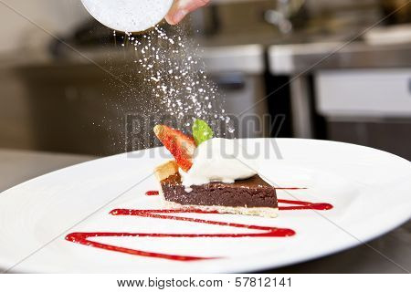 Closeup Of Dark Chocolate Tart On A Plate