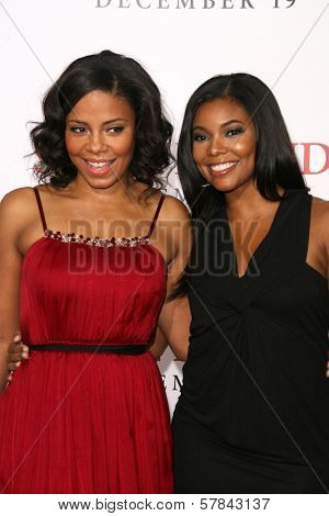 Sanaa Lathan and Gabrielle Union   at the Los Angeles Premiere of 'Seven Pounds'. Mann Village Theatre, Westwood, CA. 12-16-08