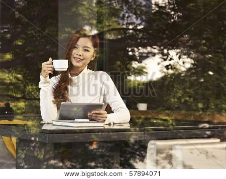 Woman In Cafe