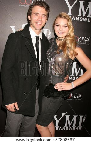 Stephen Lunsford and Aimee Teegarden  at the 5th Annual YMI Jeans Fashion Show and After Party. Music Box Theatre, Hollywood, CA. 10-06-08