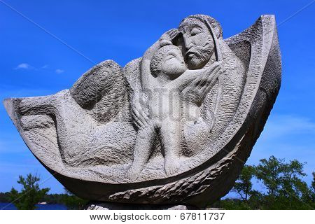 statue, which depicts love grandfather to grandson