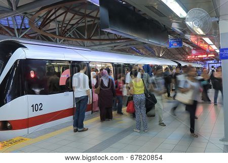Commuters at LRT station Kuala Lumpur Malaysia