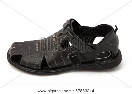 Black sandals on white