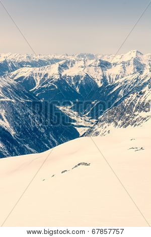 Alpine Valley Surrounded With Mountains