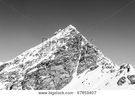 Person Ascendind A Mountain
