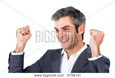 Cheerful Businessman Punching The Air In Celebration