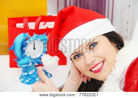 Beautiful and sexy woman wearing santa clause costume