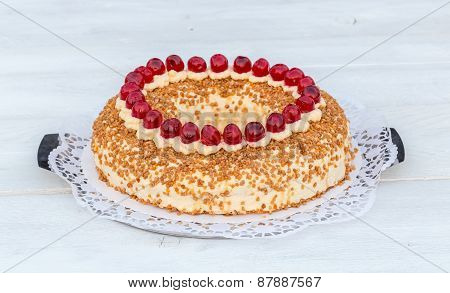 Frankfurt Crown Cake With Cherries On White Wooden