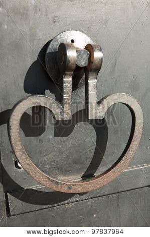 Detail of the door, door handle forged Verkhoturye bell tower of the Kremlin, Russia, Northern Ur