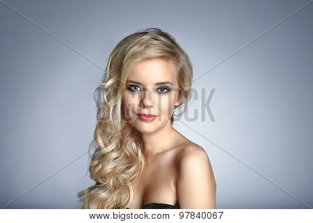Portrait Of Beautiful Woman On Monochrome Background