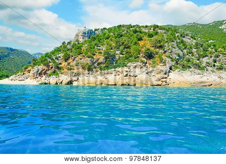 Cala Gonone Shoreline On A Cloudy Day