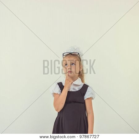 Kid thinking about something, isolated