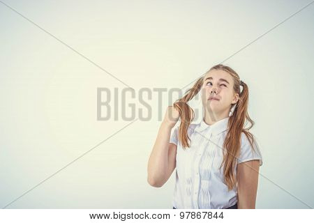 Schoolgirl thinking isolated on white background