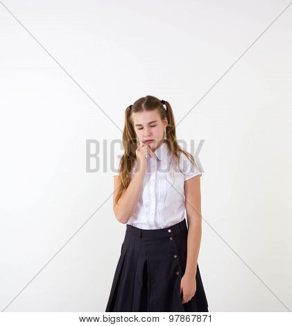 Schoolgirl thinking isolated on white background