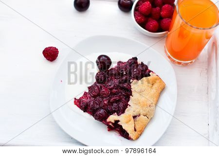 Biscuit With Cherries And A Glass Of Juice