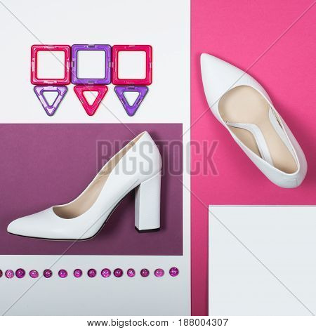 Shoes fashion. Stylish Trendy white heels on a pink background. Summer fashion Outfit, Luxury Party shoes. Minimal fashion concept.