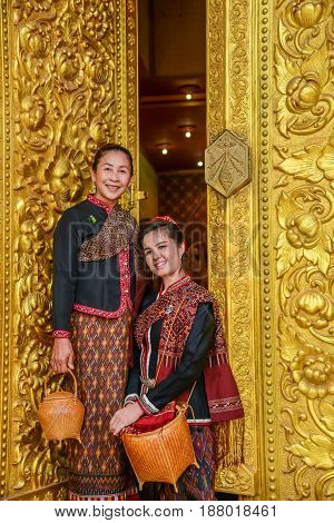 NAKORN PHANOM THAILAND - FEBRUARY 14 2015: Tourist senior ladies visit and join Thai northeastern Phutai world event day in Renunakorn of Nakorn Phanom Thailand