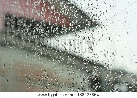 cool rain drops on window in rainyday