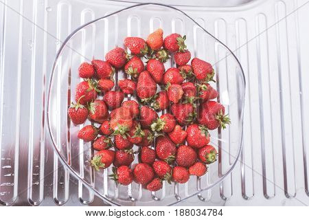 Strawberries on a plate. Ready to eat it.