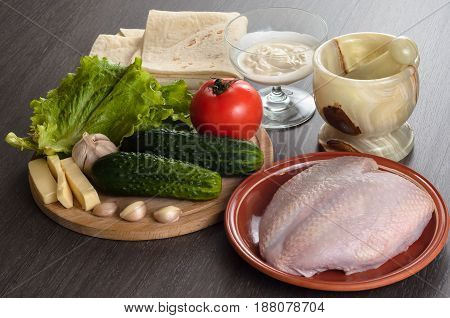 Shaurma ingredients composition on a wooden background