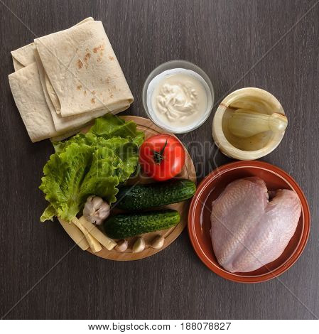 Shaurma ingredients composition on a wooden background