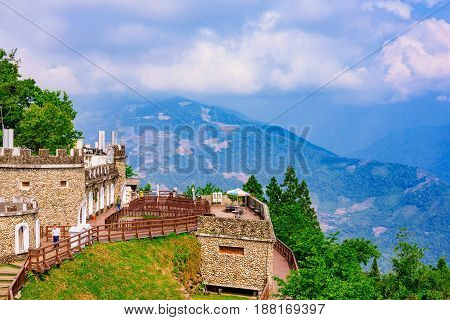NANTOU TAIWAN - MAY 05: This is a view of traditional achitecture with mountains and nature in Qingjing farm which is a popular tourist destination in Nantou on May 05 2017 in Nantou