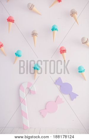 Children's zone with sweets: lollipops, ice cream and candy.