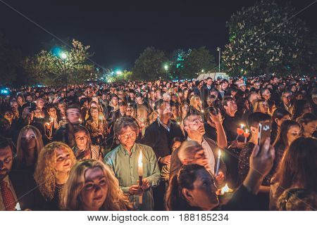 People Holding  Candle At Night In Spianada Square In Corfu Greece, During The Easter Celebrations