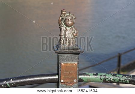 Mini sculpture statue mini liberty photo in Uzhgorod : Uzhhorod, UKRAINE photo - APRIL 1, 2017