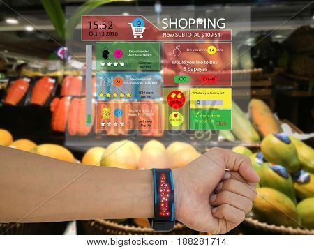 iotinternet of things marketing conceptman wear a smart watch with augmented reality technology to see the data which recommended by retailthe application show subtotalrecommended search engine
