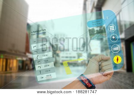 iot internet of thingsconcept man use smart watch with augmented reality technology to search the way to last destinations application show the detail and picture of destinations while travel