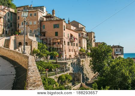 Summer view of old Grottammare village on the adriatic sea