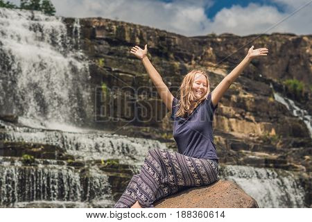 Young Woman Hiker, Tourist On The Background Of Amazing Pongour Waterfall Is Famous And Most Beautif