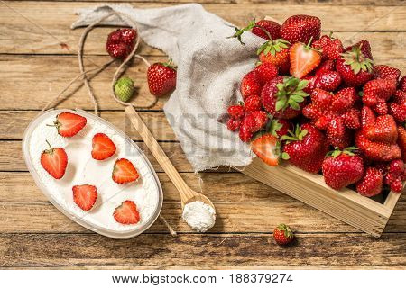 Arrangement With Fresh Strawberries On Wooden Background