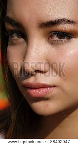 A Headshot Portrait of a Serious Teenager