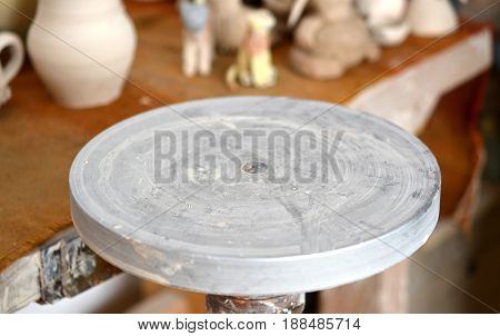 Empty potter's wheel. An empty circle, where the potter molds product. Creative studio potter. Workplace wizard Crock pottery