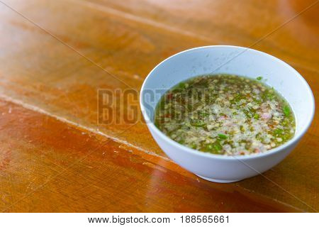 Thai Style Chilli Spicy Sauce Dipping On Wood Table, Seafood Hot Dip.