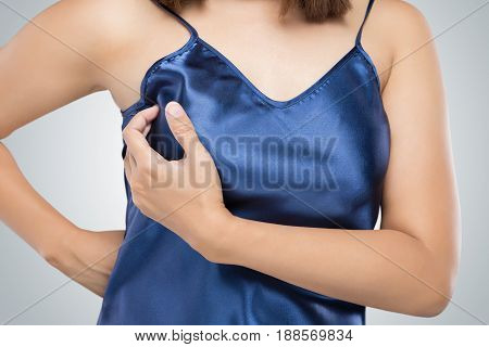 Breast cancer self check Woman holding her breast Healthy lifestyle concept