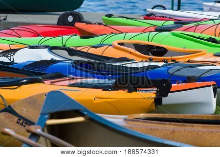 BERLIN GERMANY - MAY 03 2014: Sport boats kayaks and canoes at the marina. Background. 2nd Berlin watersports festival in Gruenau on the river Dahme tributary of the river Spree