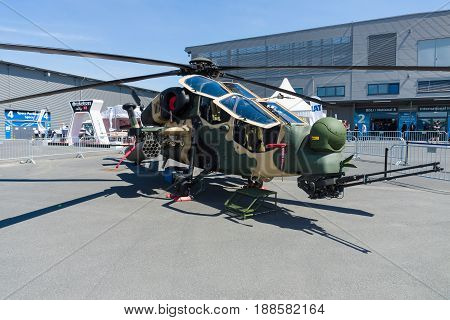 BERLIN GERMANY - MAY 21 2014: Attack helicopter TAI-AgustaWestland T129 ATAK. Turkish Air Force. Exhibition ILA Berlin Air Show 2014