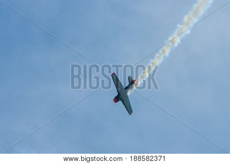 BERLIN GERMANY - MAY 21 2014: Demonstration flight of a single-engined advanced trainer aircraft North American T-6 Texan. Flying Bulls Team. Exhibition ILA Berlin Air Show 2014