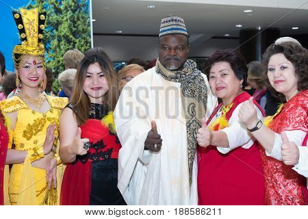 Moscow Russia - May 21 2017: Guests of the international conference of the FOHOW company in traditional costumes.