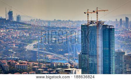 Bosphorus Bridge, a bridge which connects Europe and Asia, Istanbul, Turkey. Shooting through the glass. Retro style