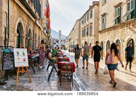 Tourists At Stradun Street In Old City Dubrovnik